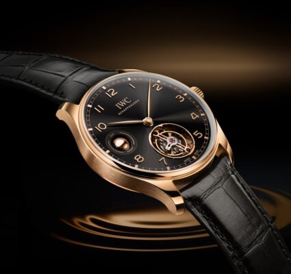 - THE IWC SCHAFFHAUSEN PORTUGIESER HAND-WOUND TOURBILLON WITH A GLOBE-SHAPED DAY AND NIGHT INDICATION